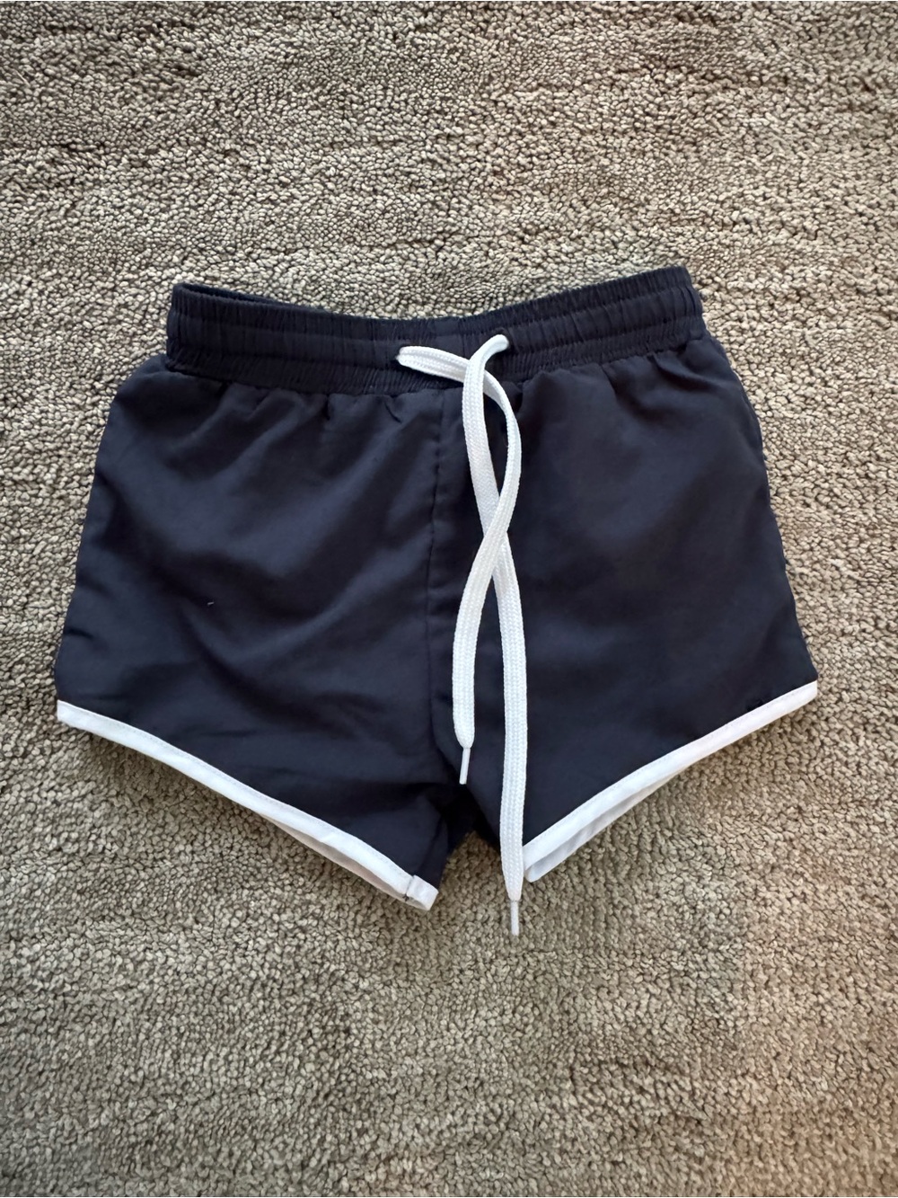 Toddler black swim Shorts with White Trim